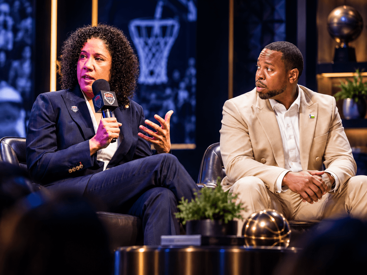 Duke Head Coach Kara Lawson and North Texas Head Coach Jason Burton in conversation on stage