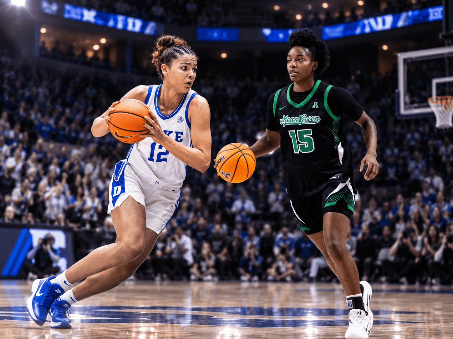 Duke number 12 and North Texas number 15 advancing the ball on court